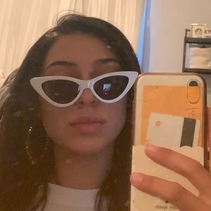 white Urban Outfitters sunglasses